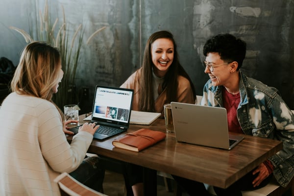 people working and laughing together