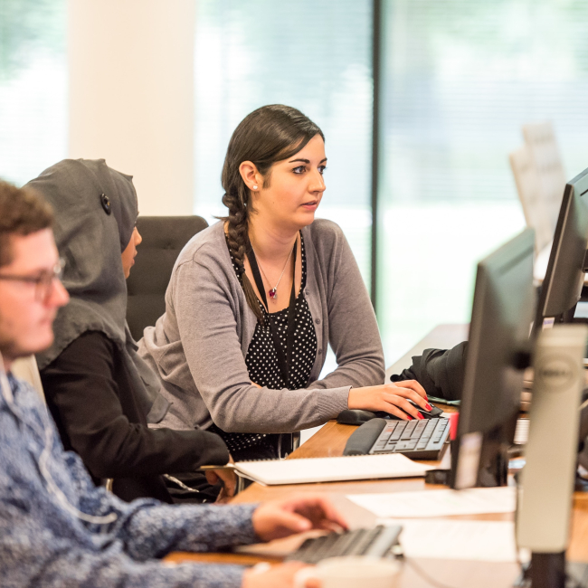 3 colleagues working with computer in Omnia office-2