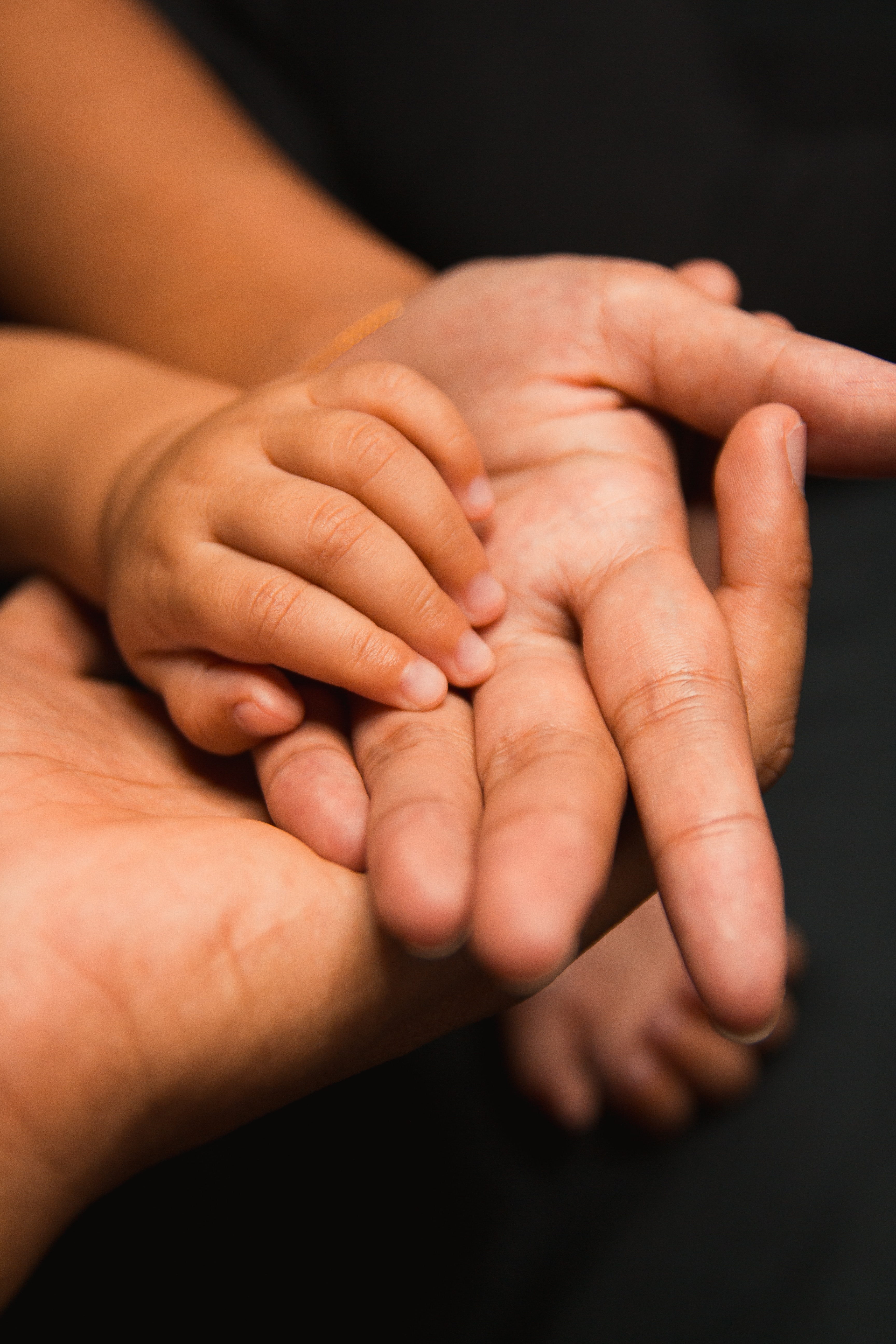 Family hand portrait with baby